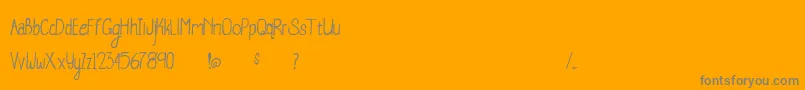 WhaleWatching-fontti – harmaat kirjasimet oranssilla taustalla