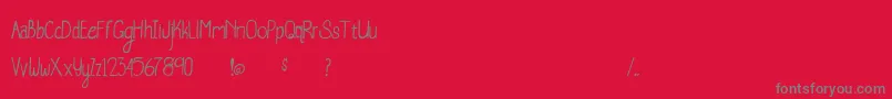 WhaleWatching-fontti – harmaat kirjasimet punaisella taustalla
