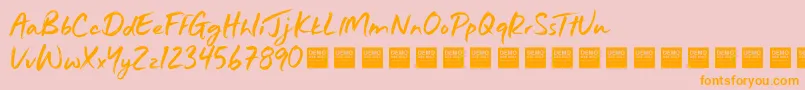 JustWrightDemo Font – Orange Fonts on Pink Background
