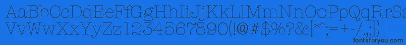 TypewriterserialXlightRegular-fontti – mustat fontit sinisellä taustalla