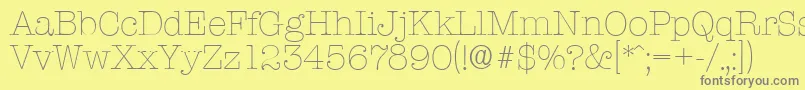 TypewriterserialXlightRegular-Schriftart – Graue Schriften auf gelbem Hintergrund