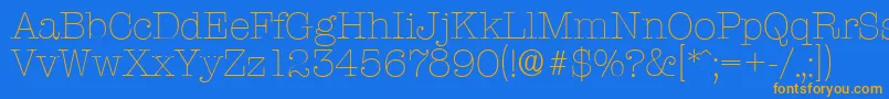 Czcionka TypewriterserialXlightRegular – pomarańczowe czcionki na niebieskim tle