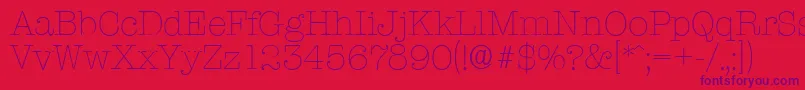 Czcionka TypewriterserialXlightRegular – fioletowe czcionki na czerwonym tle