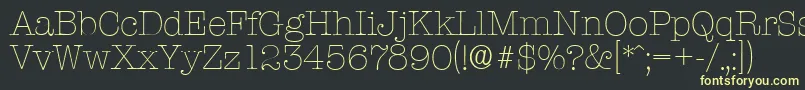 TypewriterserialXlightRegular Font – Yellow Fonts on Black Background