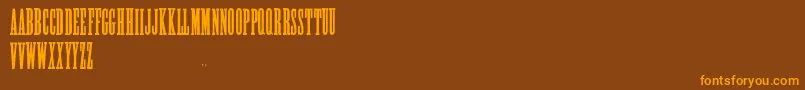 AlycidonCondensed-fontti – oranssit fontit ruskealla taustalla