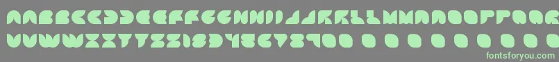 Attic ffy Font – Green Fonts on Gray Background