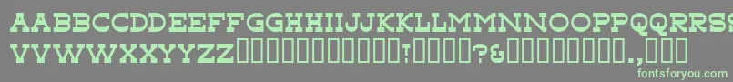 Tonky-Schriftart – Grüne Schriften auf grauem Hintergrund