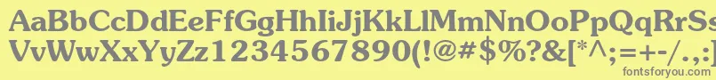 SouvenirstdDemi-fontti – harmaat kirjasimet keltaisella taustalla