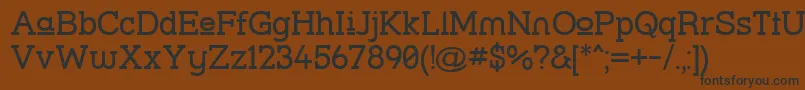 Шрифт Strslup – чёрные шрифты на коричневом фоне