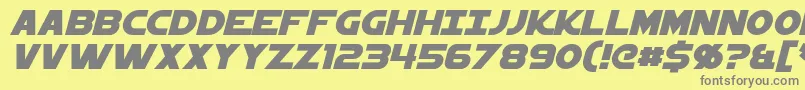 StarkillerItalic-fontti – harmaat kirjasimet keltaisella taustalla