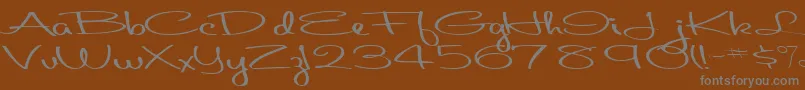 フォントAboutface33RegularTtext – 茶色の背景に灰色の文字