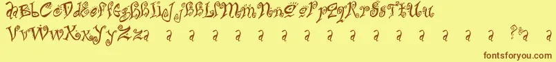 フォントBitchin – 茶色の文字が黄色の背景にあります。