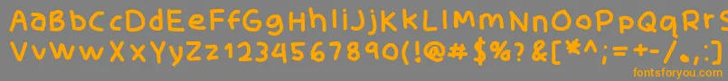 フォントSkidoomediumRh – オレンジの文字は灰色の背景にあります。