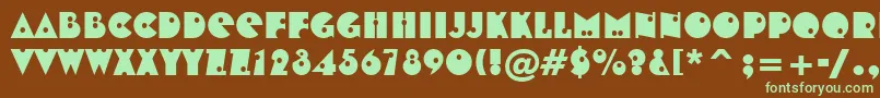 フォントShotgunBt – 緑色の文字が茶色の背景にあります。