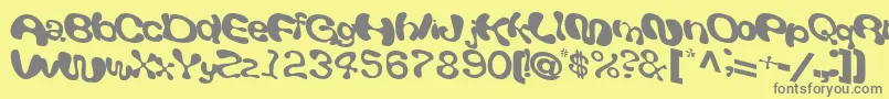 フォントGiveRegularTtnorm – 黄色の背景に灰色の文字