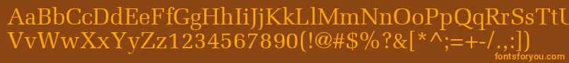 フォントProtocolSsi – オレンジ色の文字が茶色の背景にあります。