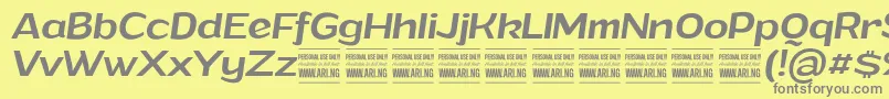 GrandimediumitalicPersonalUse-fontti – harmaat kirjasimet keltaisella taustalla