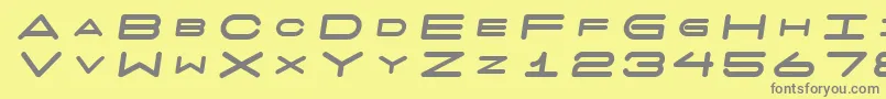 7daysfatoblique-fontti – harmaat kirjasimet keltaisella taustalla