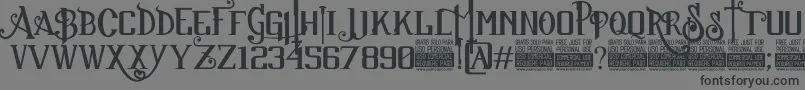 Czcionka SuckerFontJcFonts – czarne czcionki na szarym tle