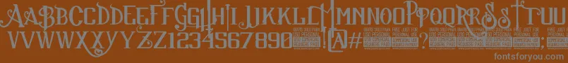 SuckerFontJcFonts Font – Gray Fonts on Brown Background