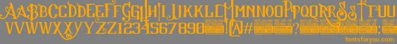 SuckerFontJcFonts Font – Orange Fonts on Gray Background