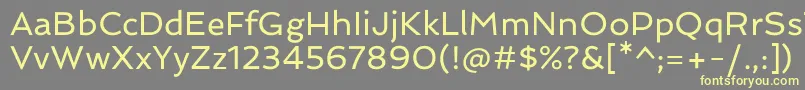 SpinnakerRegular Font – Yellow Fonts on Gray Background