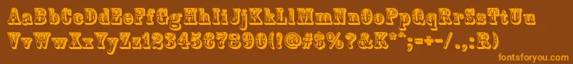 フォントCountryWestern – オレンジ色の文字が茶色の背景にあります。