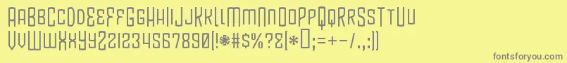 BlamdudeBb-fontti – harmaat kirjasimet keltaisella taustalla