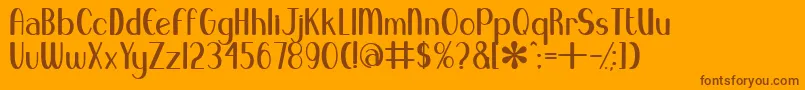 BlueMelodyUltrabold-fontti – ruskeat fontit oranssilla taustalla