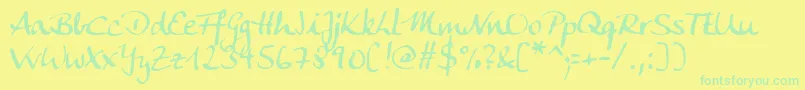 AnkecalligFg Font – Green Fonts on Yellow Background