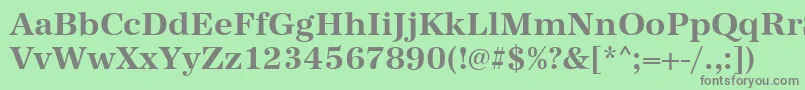 フォントAntiquastdBold – 緑の背景に灰色の文字