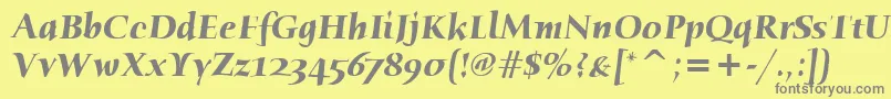 HumanaSerifItcBoldItalic-fontti – harmaat kirjasimet keltaisella taustalla