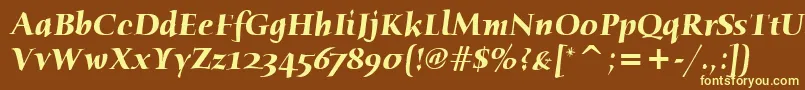 HumanaSerifItcBoldItalic-fontti – keltaiset fontit ruskealla taustalla