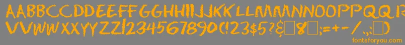 フォントDserase – オレンジの文字は灰色の背景にあります。