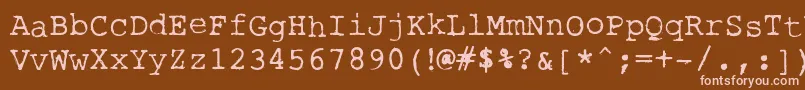 RoughTypewriter-fontti – vaaleanpunaiset fontit ruskealla taustalla
