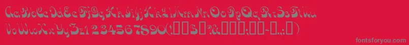 フォントTradewindssk – 赤い背景に灰色の文字