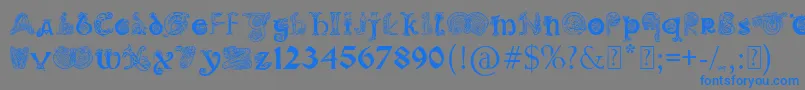 PaulsIlluminatedCelticFont-Schriftart – Blaue Schriften auf grauem Hintergrund