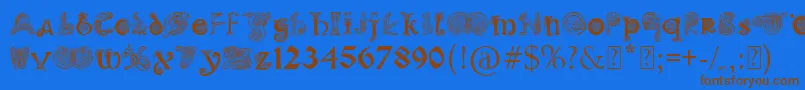 フォントPaulsIlluminatedCelticFont – 茶色の文字が青い背景にあります。