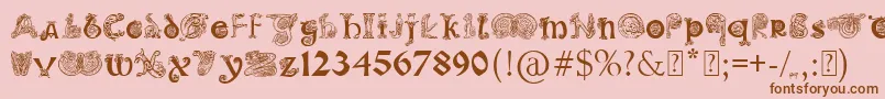 フォントPaulsIlluminatedCelticFont – ピンクの背景に茶色のフォント