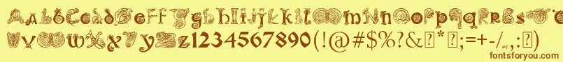 PaulsIlluminatedCelticFont-fontti – ruskeat fontit keltaisella taustalla