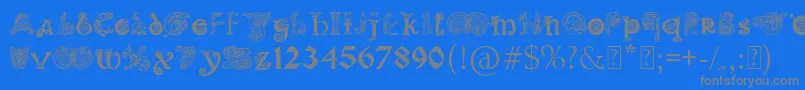 Czcionka PaulsIlluminatedCelticFont – szare czcionki na niebieskim tle