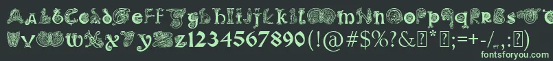 Шрифт PaulsIlluminatedCelticFont – зелёные шрифты на чёрном фоне