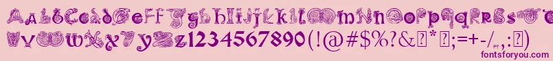 PaulsIlluminatedCelticFont-fontti – violetit fontit vaaleanpunaisella taustalla