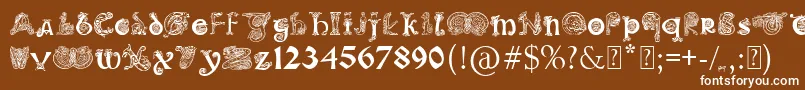 PaulsIlluminatedCelticFont-fontti – valkoiset fontit ruskealla taustalla