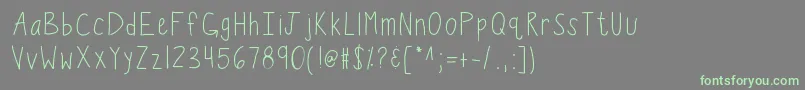 フォントKbwiggleworm – 灰色の背景に緑のフォント