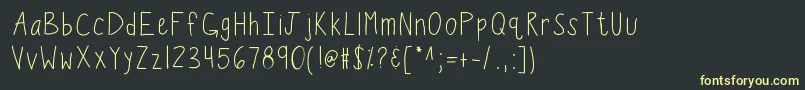 フォントKbwiggleworm – 黒い背景に黄色の文字
