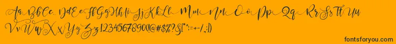 Шрифт ValledofasJustPersonalOnly – чёрные шрифты на оранжевом фоне