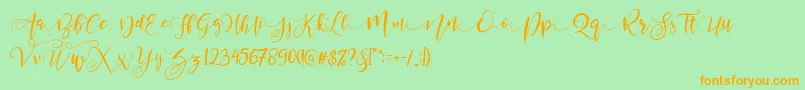 Шрифт ValledofasJustPersonalOnly – оранжевые шрифты на зелёном фоне
