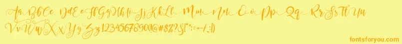 Шрифт ValledofasJustPersonalOnly – оранжевые шрифты на жёлтом фоне