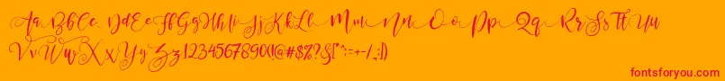 ValledofasJustPersonalOnly-Schriftart – Rote Schriften auf orangefarbenem Hintergrund